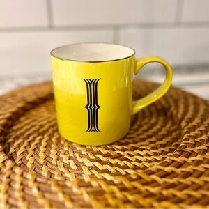 Opalhouse Yellow “ I “ mug with gold and black detail.‎